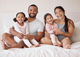 Canvas Print - Morning, love and bedroom with portrait of a happy family for lifestyle, support and relax together. Happiness, family home and smile with parents hugging children in bed for wake up, trust and care