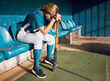 © Lumeez Ismail/peopleimages.com - Baseball, sports bench and woman athlete angry thinking of game loss while waiting to play. Frustrated, sad and serious softball player girl in depressed mood for professional match failure.