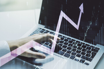 Poster - Double exposure of abstract creative financial chart with upward arrow and hands typing on computer keyboard on background, research and strategy concept