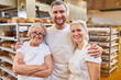 © Robert Kneschke - Successful bakery team with boss and apprentices
