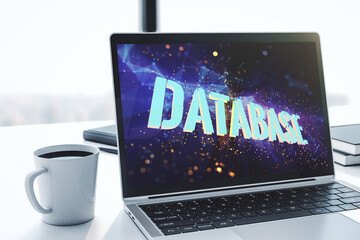 Poster - Modern computer monitor with creative Database word hologram, research and development concept. 3D Rendering