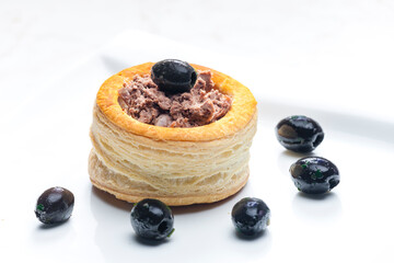 Wall Mural - puff pastry filled with terrine served with black olives