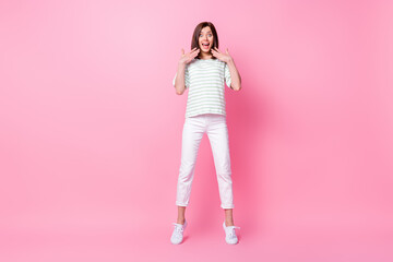 Sticker - Full size photo of nice lovely girl wear striped t-shirt white pants sneakers impressed staring at sale isolated on pink color background