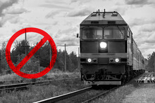 Diesel Locomotive Rides On Rails, Black And White Photo. Russian Train. Railroad Ban. Sanctions On The Transport Of Goods. Refusal To Issue Visas To Citizens Of Russia. Introduction Of A Visa 