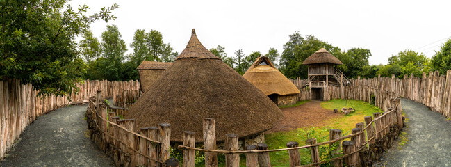 Poster - panorama view of a reconstructed early medieval ringfort in the Irish National heritage Park