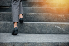 Stepping Going Up Stairs In City, Closeup Legs Of Businesswoman Hurry Up Walking On Stairway, Rush Hour To Work In Office A Hurry In Morning, Foot Of Business Woman Wear Black Shoes Step Up Success