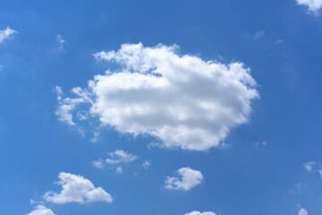 Wall Mural - clear blue sky background with white clouds