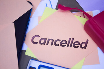 Poster - Cancelled. Text on adhesive note paper. Event, celebration reminder message.