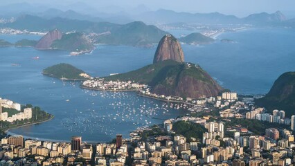 Wall Mural - Zoom in time lapse view Sugarloaf mountain and Rio cityscape during summer in Rio de Janeiro, Brazil.	
