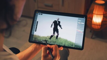 Poster - male 3d designer creating 3d animation of video game character in design application on modern digit