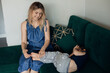 Blonde tender smiling and kind woman and little boy, son playing and embracing, have fun, tickling. Mother day weekend