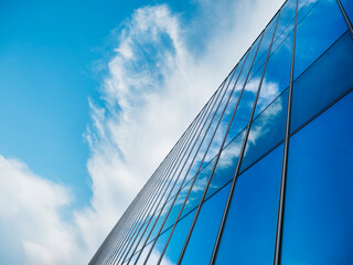 Fototapete - Modern building Glass facade with Sky reflection Architecture details