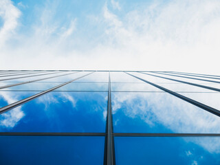 Fototapete - Modern building Glass facade with Sky reflection Architecture details