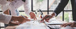 © Daenin - Young colleagues discussing business and price chart analyzes business people on the table great in modern coworking office teamwork concept. Calculate personal tax for customers