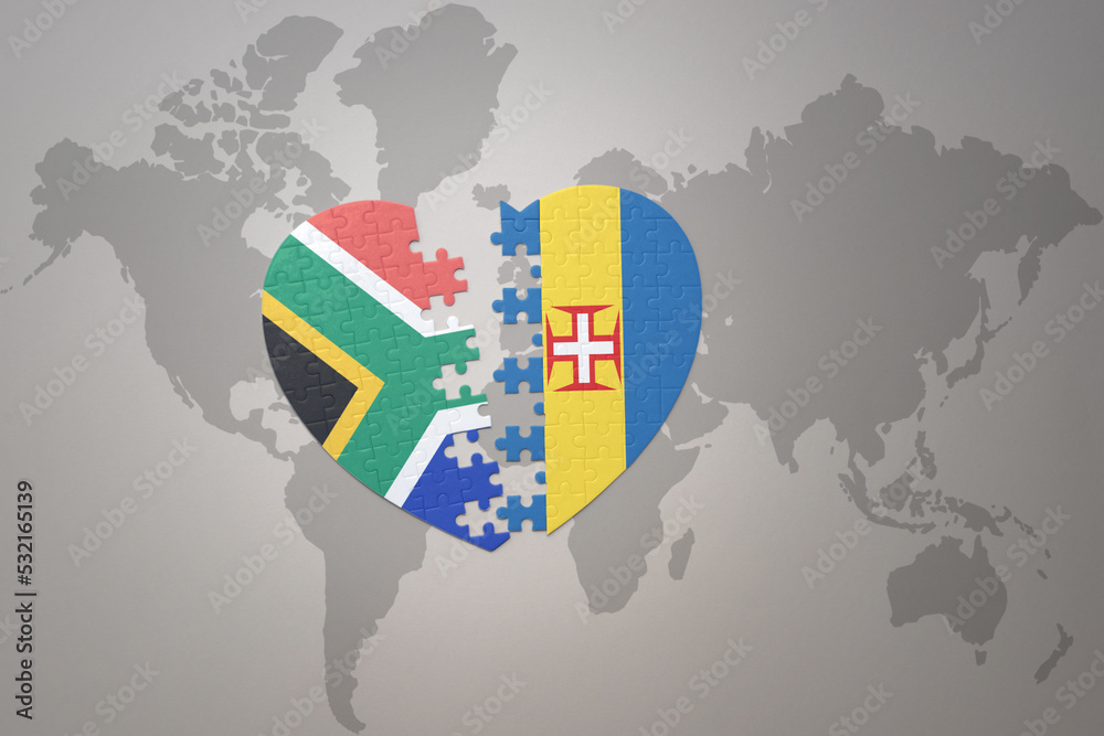 puzzle heart with the national flag of south africa and madeira on a ...