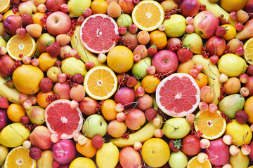 Wall Mural - Fresh ripe organic fruits from market: pear and orange, grapefruit and lemon, apricot and berries, apple and banana