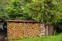 A Pile Of Stacked Firewood, Prepared For Heating The House, Firewood Harvested For Heating In Winter, Chopped Firewood On A Stack, Firewood Stacked And Prepared For Winter Pile Of Wood Logs