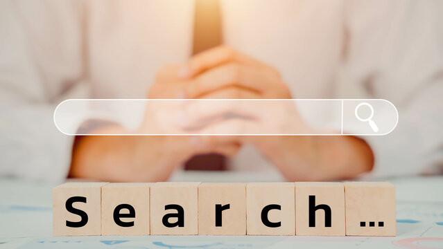 Search Word Written On Wooden Cubes or Block. Concepts with business background.
