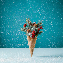 Christmas Ice Cream Cone  In Snow On Blue Background. New Year