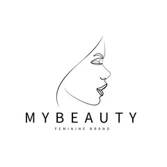 Wall Mural - Woman's face and body one-line art beauty logo design artwork