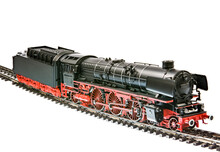 Isolated Toy Train With A Steam Engine Locomotive