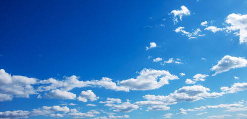 Wall Mural - White clouds in blue sky.