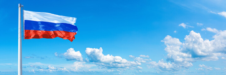 Russia flag on a blue sky *** Horizontal banner 12000 x 4005 px