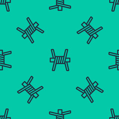 Sticker - Blue line Barbed wire icon isolated seamless pattern on green background. Vector