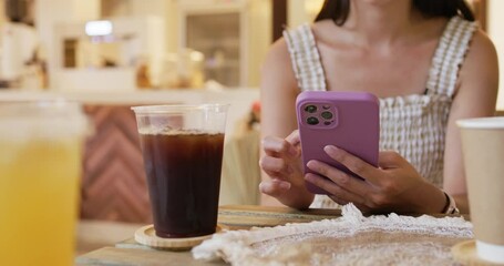 Sticker - Woman use cellphone in coffee shop