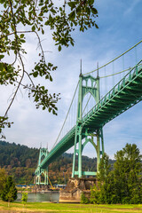 Autumn landscape of St. John's Bridge over Cathedral City Park in Portland. St. John's Bridge over Willamette River, viewed from Cathedral City Park in Portland, Oregon State.