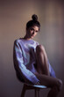 © Lucas Ottone/Stocksy - Serious young woman portrait