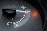 Fototapeta Sport - Pointer at the high temp point of the temperature gauge in the vehicle radiator and the symbol has the red light is on