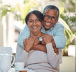 © David L/peopleimages.com - Portrait of elderly couple hug and bonding, happy and enjoying tea break at home together. Retirement, love and smiling man and woman embracing and resting in their house, fun and affection affection