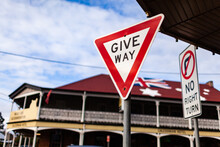 Give Way Street Sign At Intersection Of Side Road With Main Street In Aussie Town