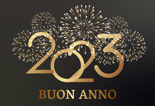Carta O Banner Per Il Felice Anno Nuovo 2023 In Oro Con Dietro Un Fuoco D'artificio Di Colore Oro Su Uno Sfondo Sfumato Nero E Grigio
