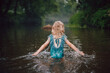 little girl in the river