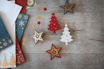 wooden decorative objects - wooden christmas trees and wooden stars for decorating new year and chri