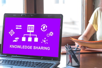 Wall Mural - Knowledge sharing concept on a laptop screen