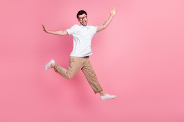 Sticker - Full length photo of attractive cheerful satisfied man hurry up big black friday sale shopping empty space isolated pink color background