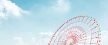 Ferris Wheel On Blue Sky Background Concept 
