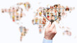 © Robert Kneschke - Magnifying glass searches for suitable personnel on the world map