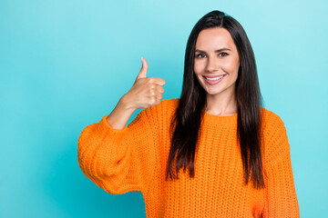 Sticker - Portrait of cheerful satisfied person arm finger show thumb up approve isolated on emerald color background