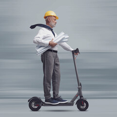 Wall Mural - Engineer riding an electric scooter