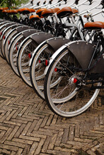 Similar Bikes Parked In Courtyard
