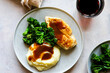 © Nadine Greeff/Stocksy - Chicken gravy, mashed potato and broccolini vegetable