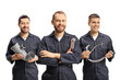 © Ljupco Smokovski - Team of plumbers holding plumbing equipment