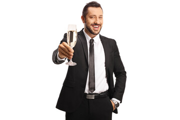 Businessman toasting with a glass of champagne and smiling at camera