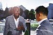 © Oleksii Syrotkin/Stocksy - CEO having business conversation with manager