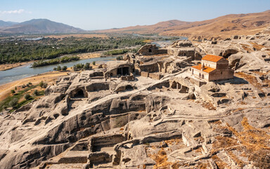 Wall Mural - Aerial view of Uplistsikhe. It is an ancient rock-hewn town in eastern Georgia