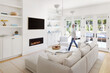 © Trinette Reed/Stocksy - Person walking in modern design interior farmhouse living room